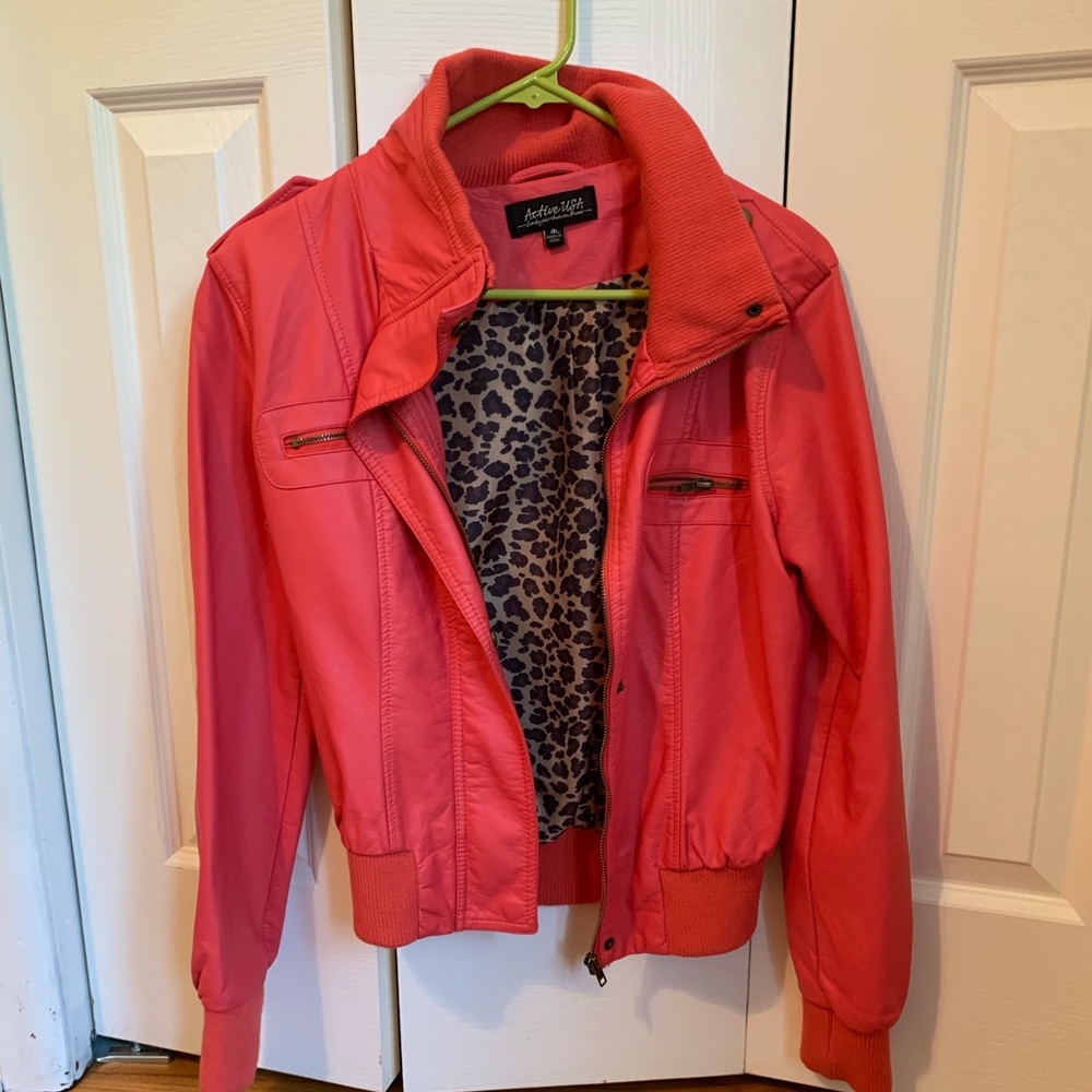 Hot pink leather jacket with cheetah print inside